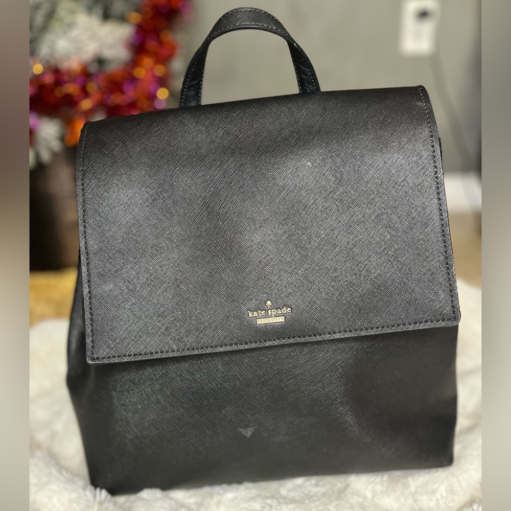 Black Kate Spade leather flap backpack